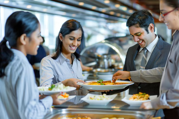 Corporate event buffet with professionals serving food